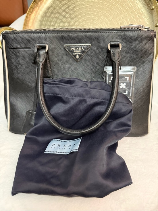 Prada Handbags - Prada Black Saffiano Leather Satchel with Silver-Tone Logo